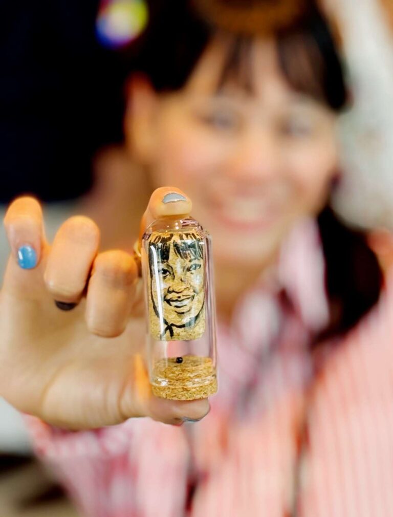 Black and white wine cork Caricatures at holiday corporate party